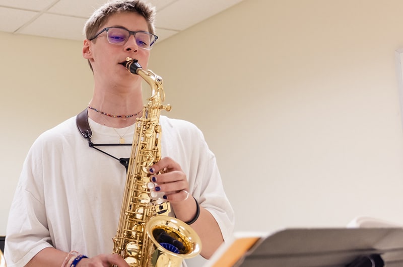 Saxophone student taking a private lesson